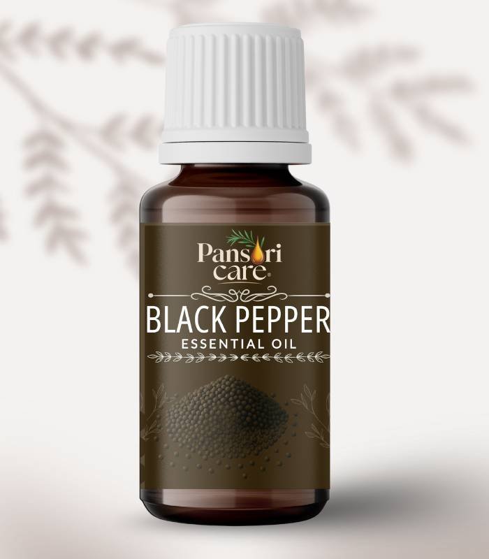 5 Pansari Care Black Pepper Essential Oil bottle with whole black peppercorns.