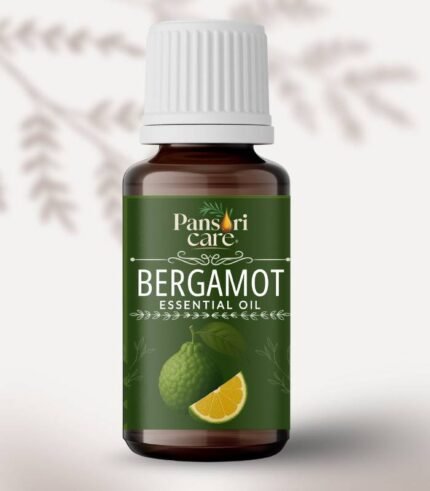 Pansari Care Bergamot Essential Oil bottle with fresh bergamot fruit and leaves.
